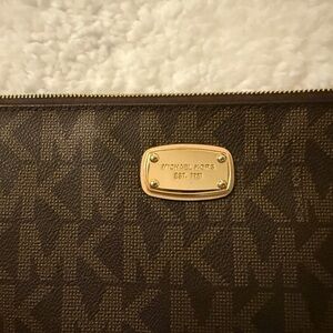 Michael Kors Signature Logo Brown Zip Clutch Wristlet w/ gold hardware. Classic